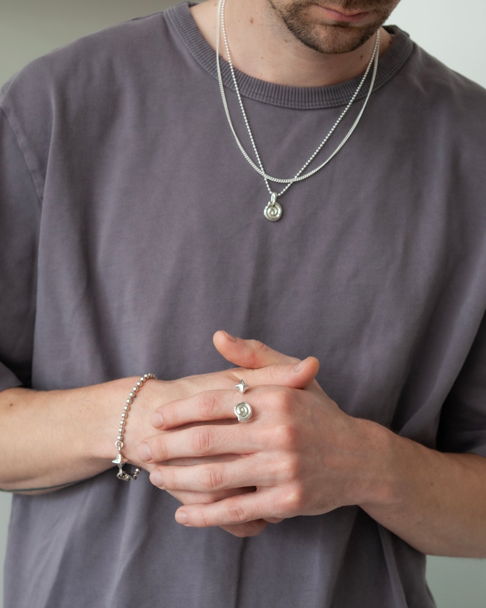 EXISTENTIAL SWIRL NECKLACE